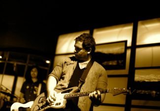 Josh Del leading worship